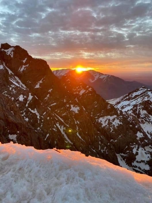 Sunrise from Mount Toubkal, the highest peak in North Africa in the High Atlas Mountain Range - Blog - Dreaming of Benis